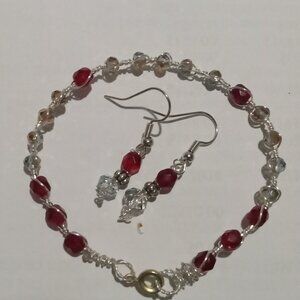 red and clear crystal beaded necklace and matching earrings
